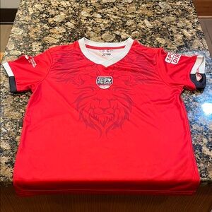 EUC Red soccer jersey with Lion Design